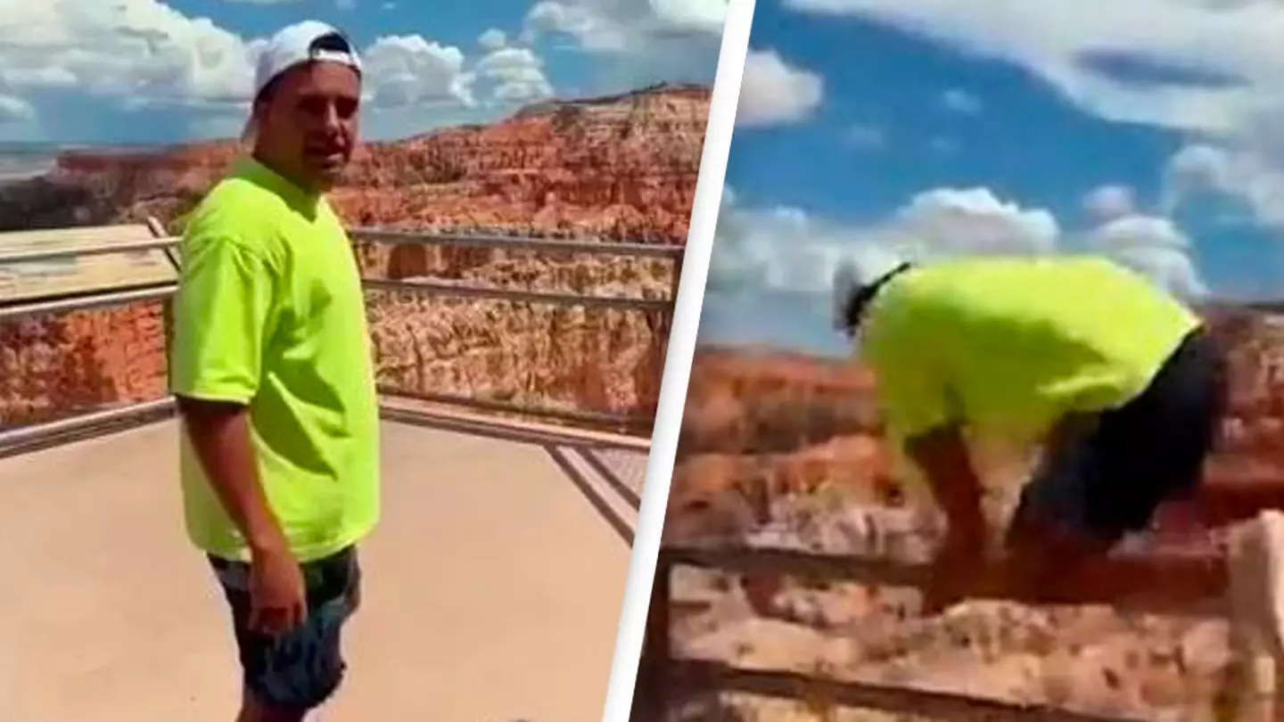 Man who pretended to leap canyon barrier loses footing and almost falls over the edge