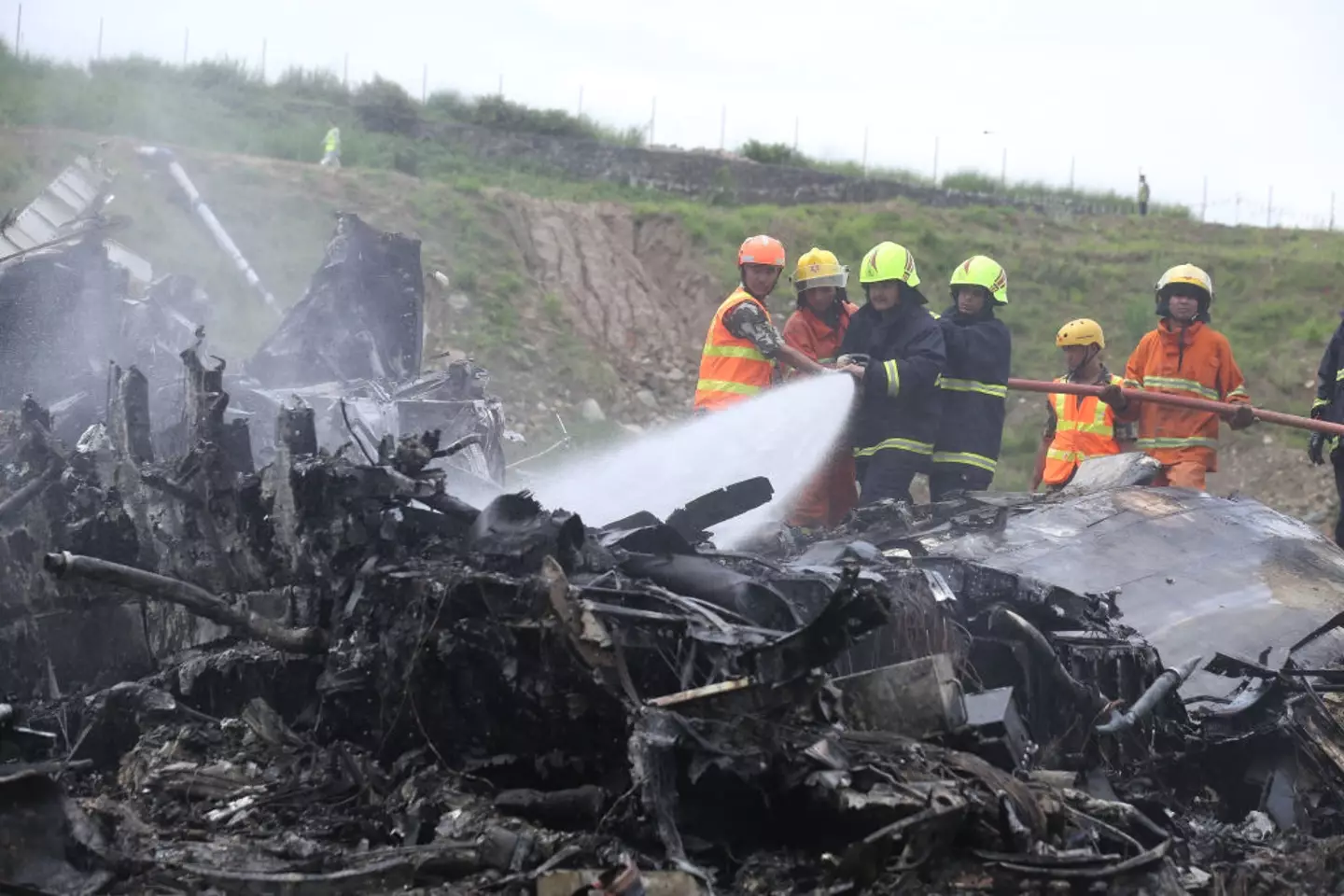 Only the pilot survived the crash, which resulted in a fireball. (Subaas Shrestha/NurPhoto via Getty Images)