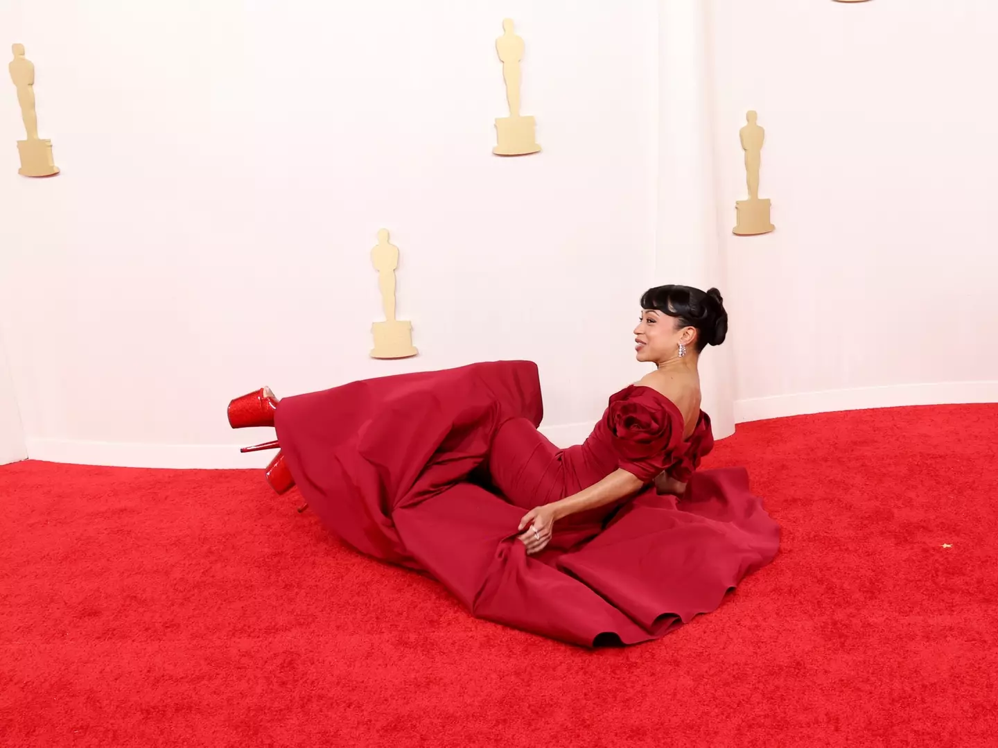Liza Koshy took a tumble on the red carpet.