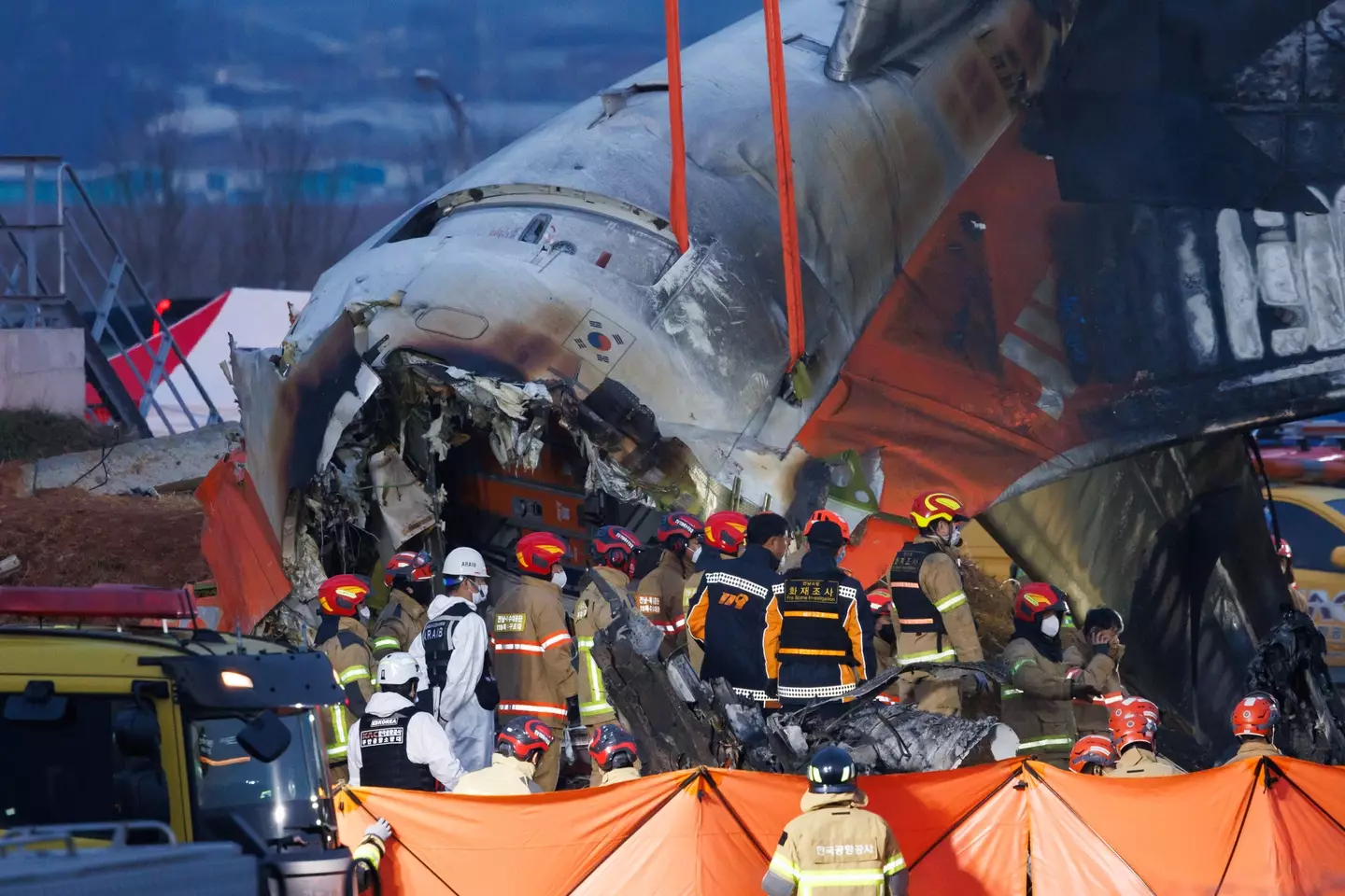 The plane was destroyed in the collision (SeongJoon Cho/Bloomberg via Getty Images)