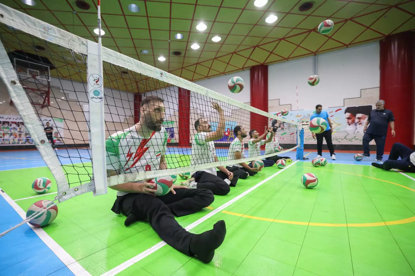 Mehrzad training with the Iranian sitting volleyball team (ATTA KENARE/AFP via Getty Images)