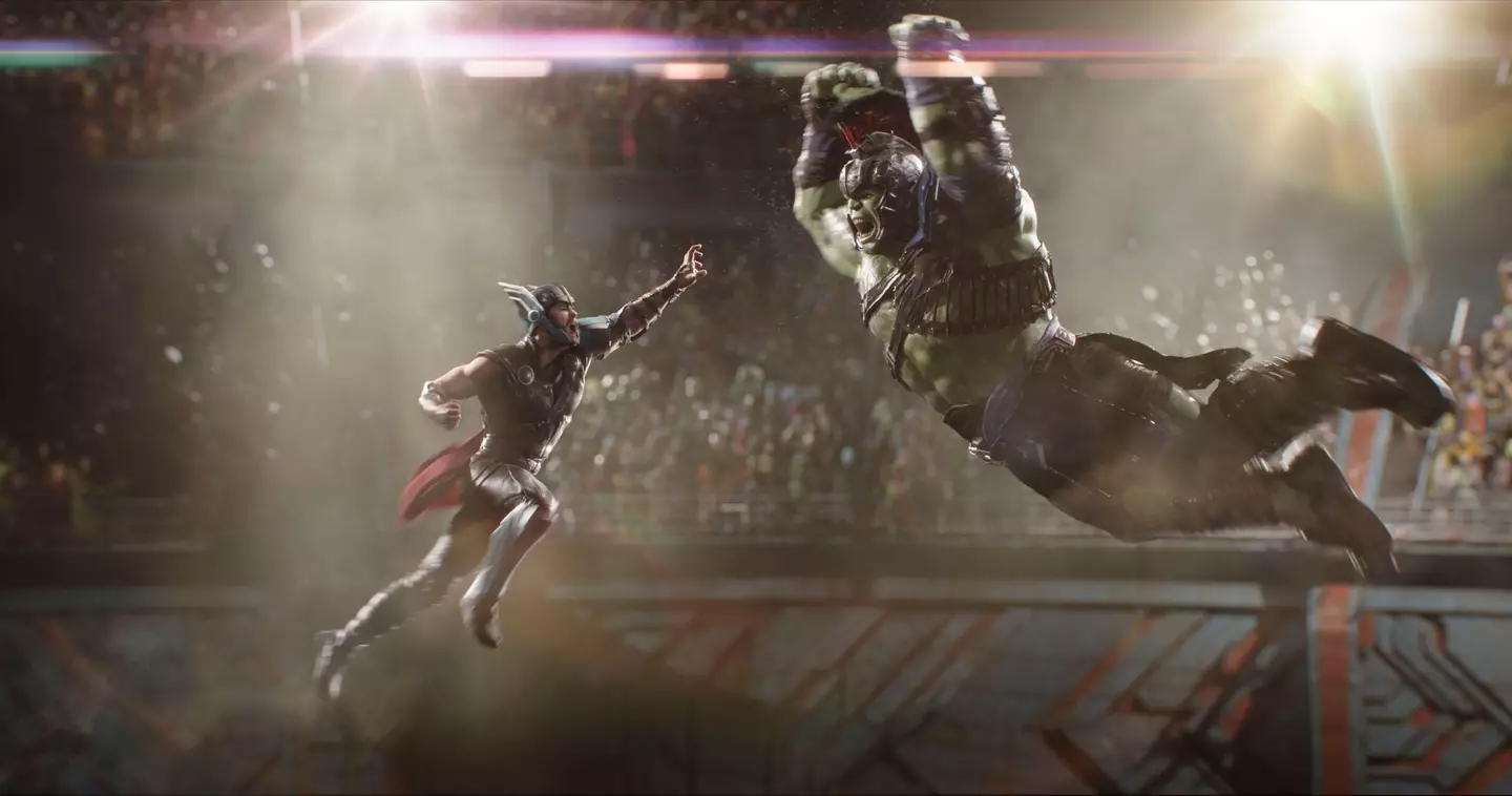 Chris Hemsworth as Thor, fighting Mark Ruffalo's The Hulk.