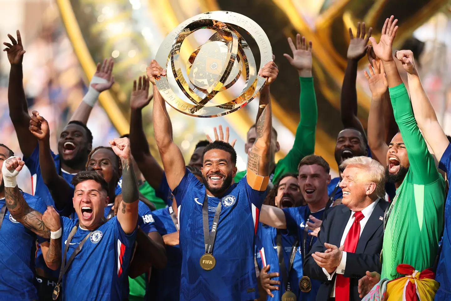 Unlike the FIFA president, Trump stayed on the stage (Buda Mendes/Getty Images)