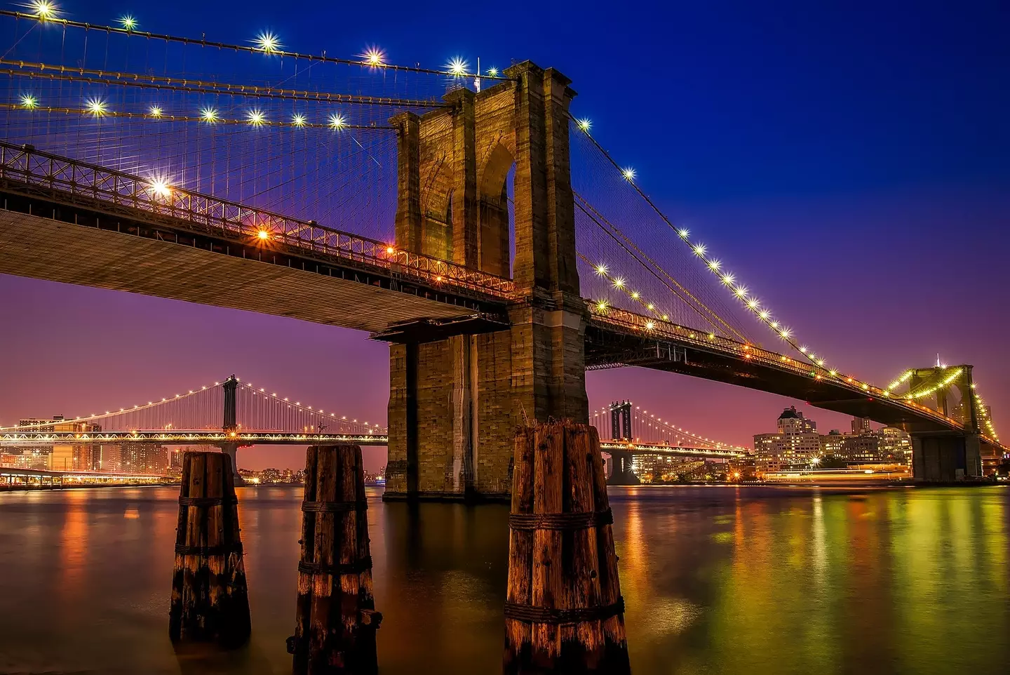 Brooklyn Bridge is popular with tourists.
