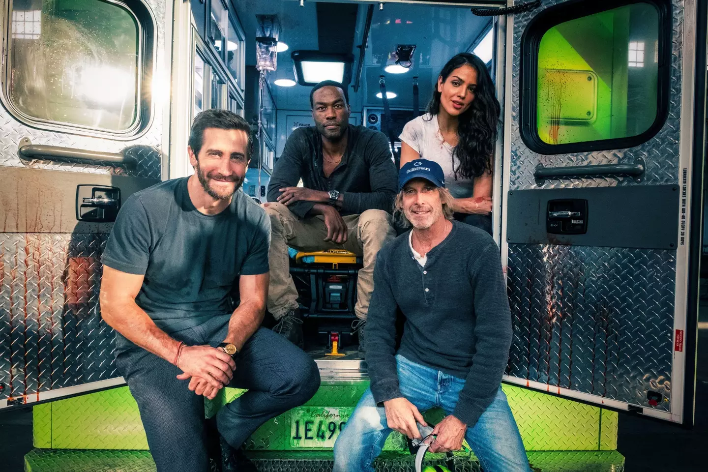 Michael Bay with the cast of Ambulance.
