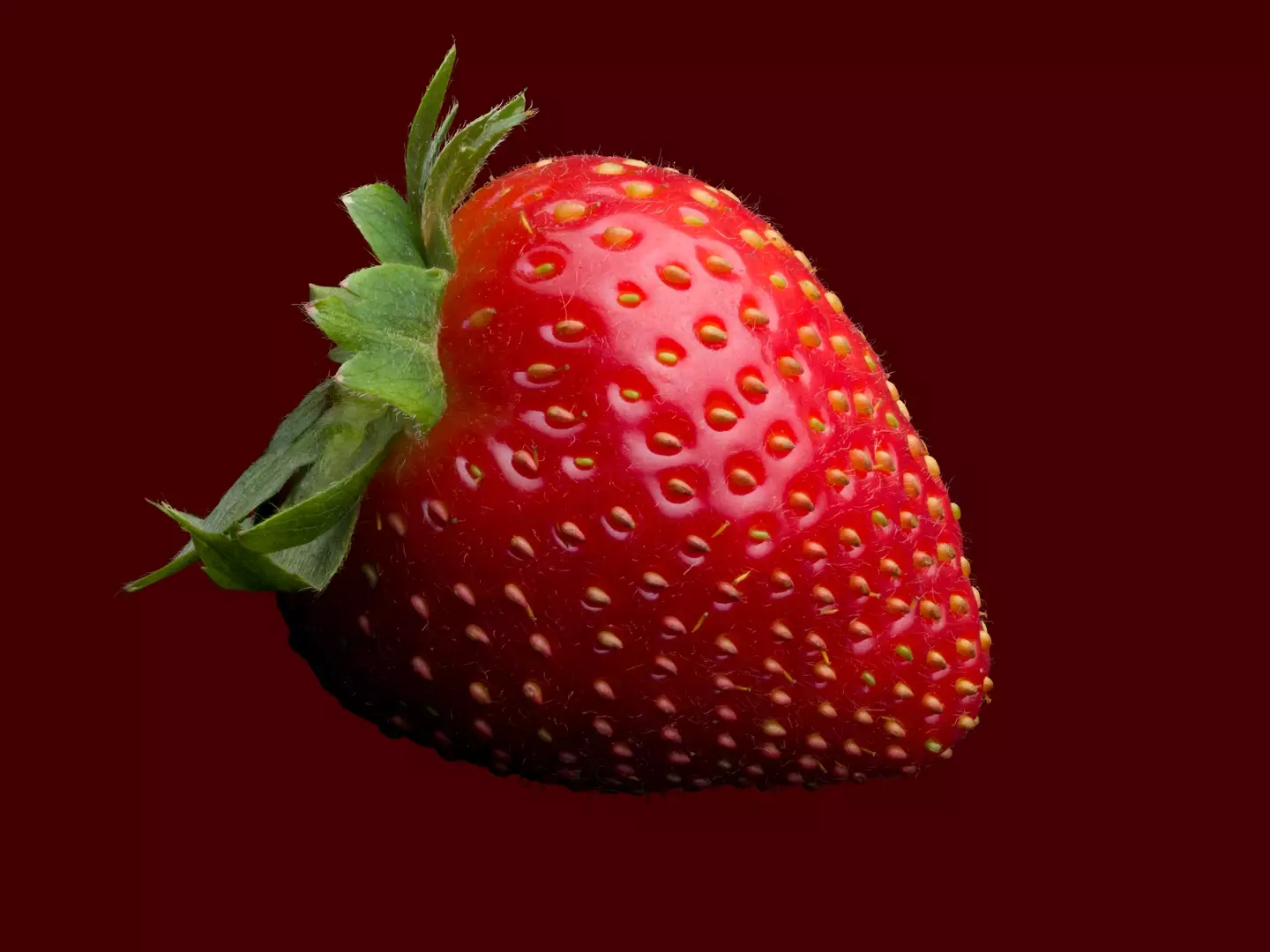 People have been left mind-blown by what the white dots on strawberries are.