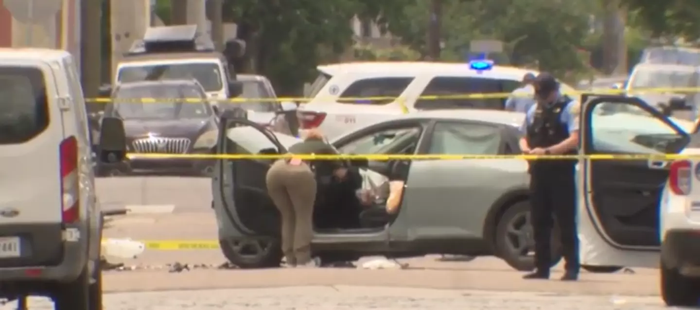 The suspect allegedly tried to flee the scene with the officer still attached to the car (WDSU)