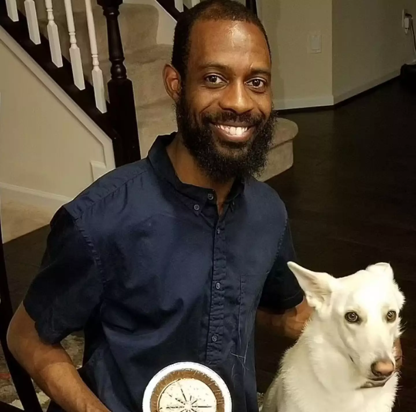 Antione Tuckson pictured with his dog Pearl in 2017.