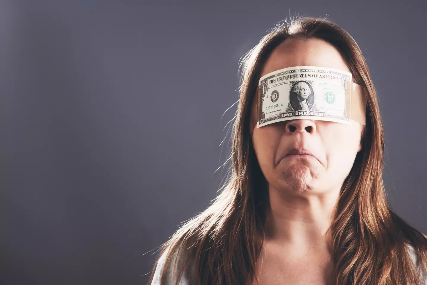 The younger portion of Gen Z are seemingly 'cash-blind' as a poll revealed they tend to avoid carrying dollars in case they misplace their cash or get robbed (Getty Stock Image)
