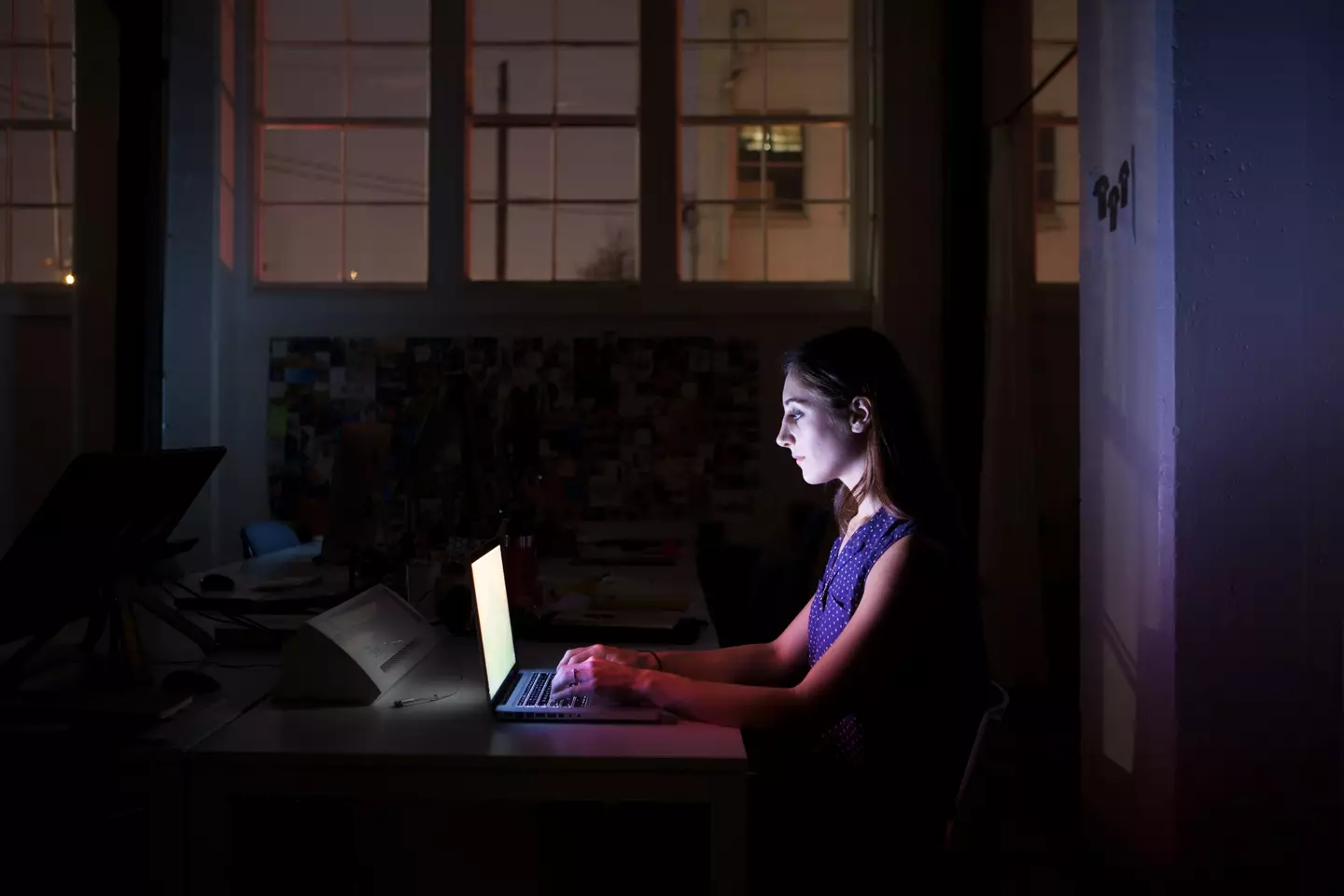 You should be winding down from work within two hours of going to sleep (Getty Stock)