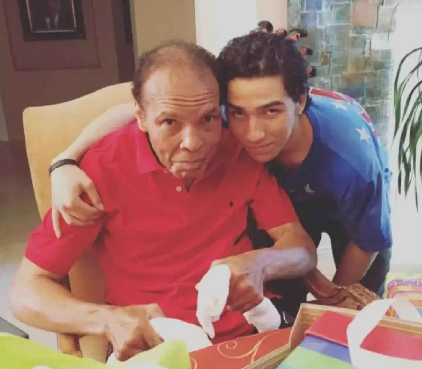 Nico with his grandfather Muhammad Ali.