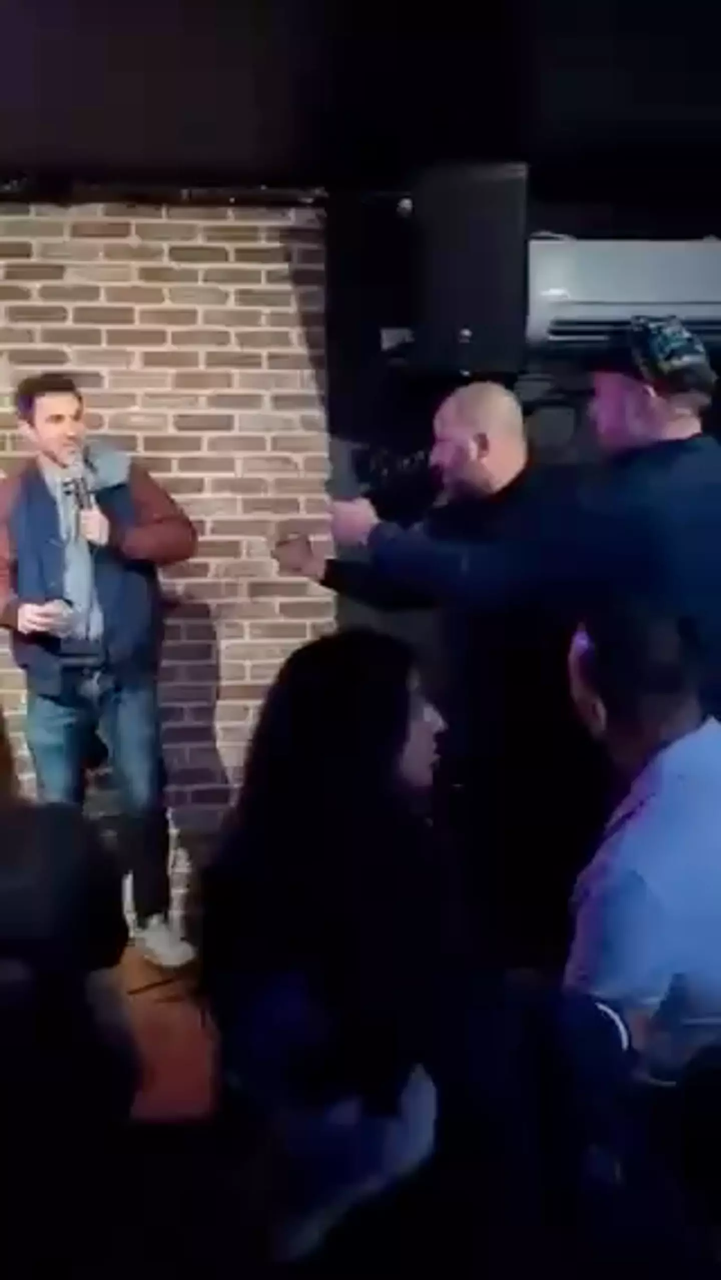 Normand was escorted off stage.