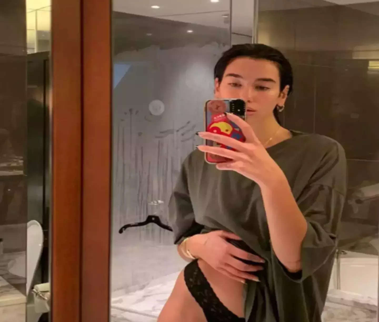 Fans spotted the NSFW detail (Instagram/@dualipa)