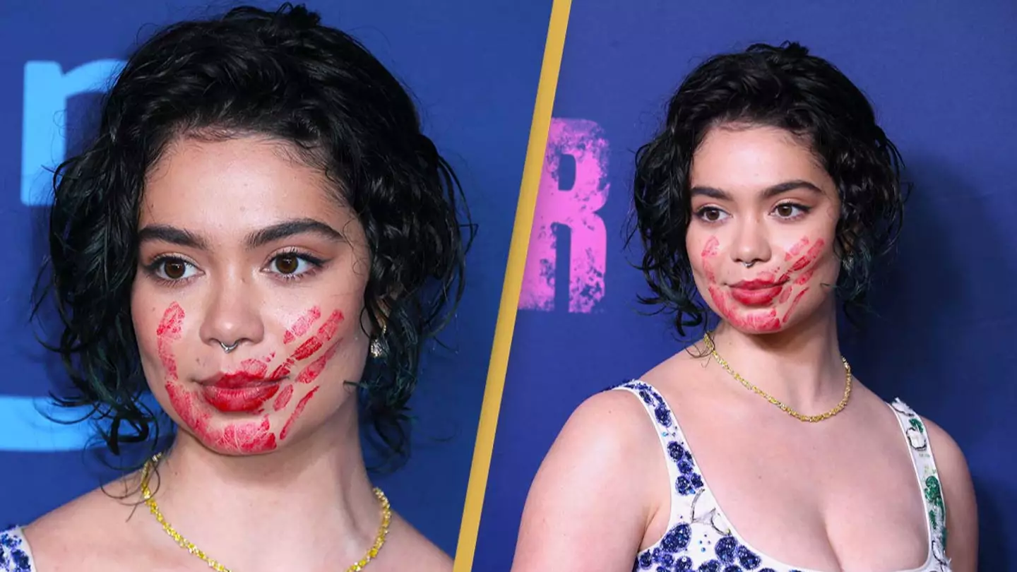 Moana's Auli'i Cravalho walks red carpet with bloody handprint smeared across her face