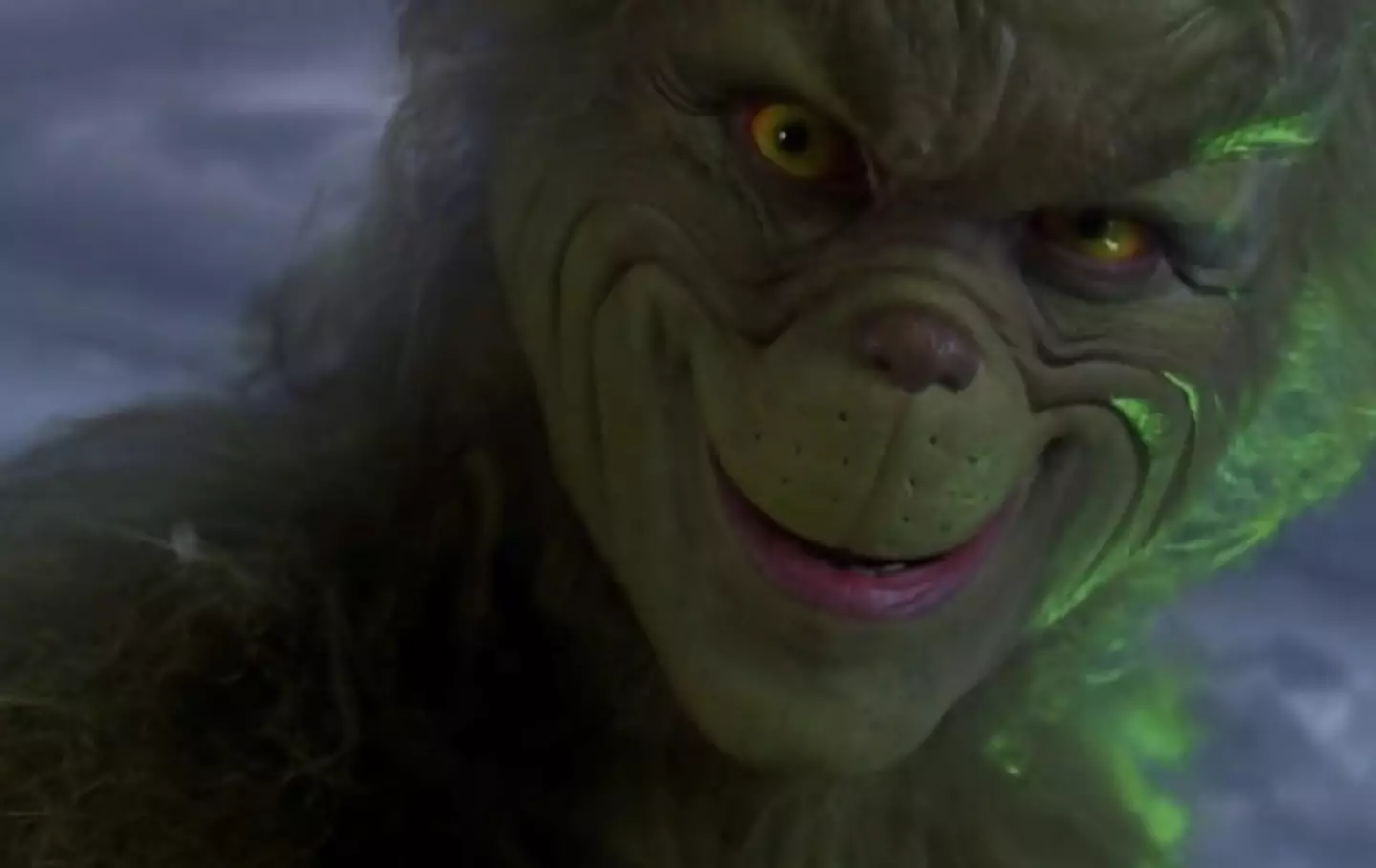 Jim Carrey reveals how the iconic Grinch smirk was created.