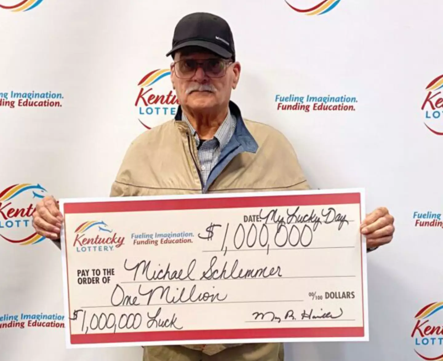 Michael Schlemmer with his $1 million check.