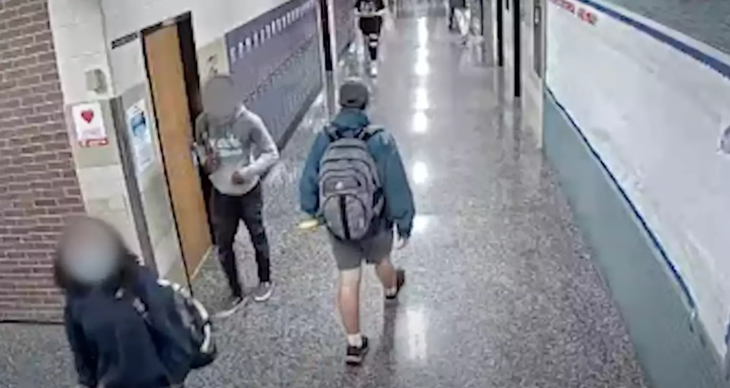 Menchville High School looked through surveillance footage of the hallway, and CCTV captured a white, tenth grade student strolling banana-in-hand down the corridor.
