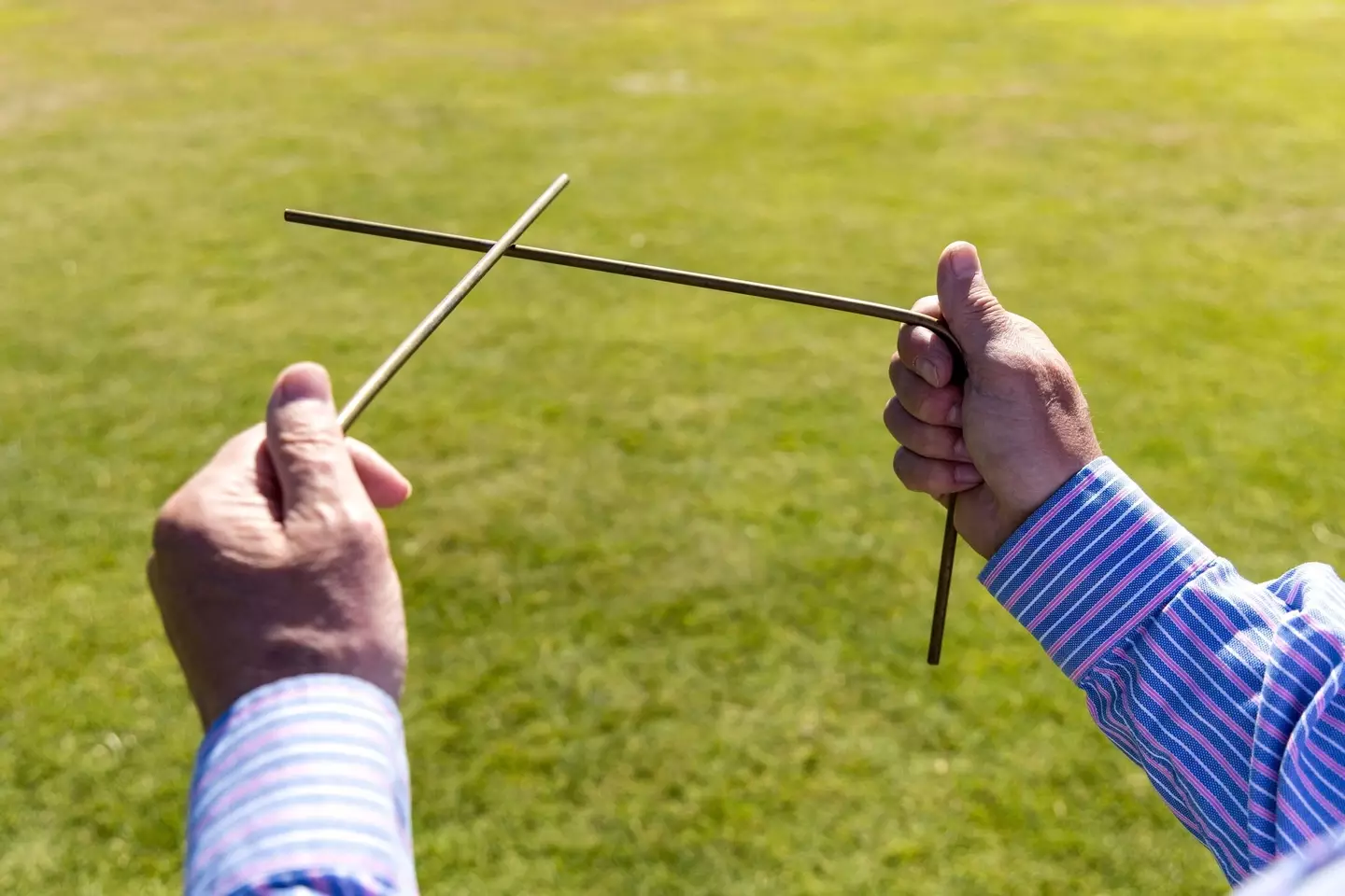 People still do Dowsing today, using metal rods (Chris Griffiths / Getty)