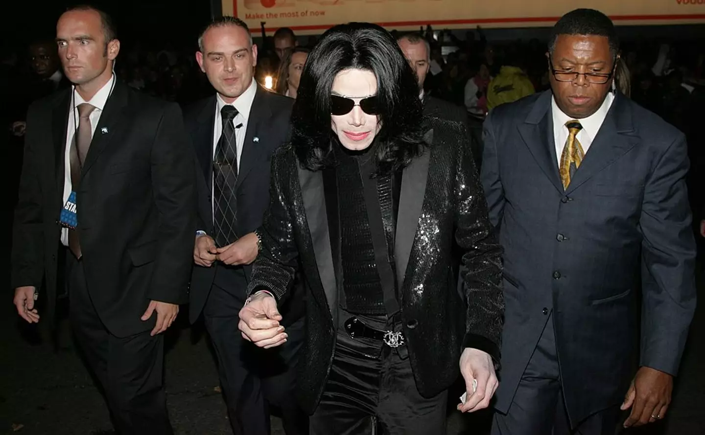 Simon Newton pictured far-left alongside Michael Jackson and his entourage of bodyguards, during the singer's visit to London for the World Music Awards in November 2006 (Getty Images/Getty Images)