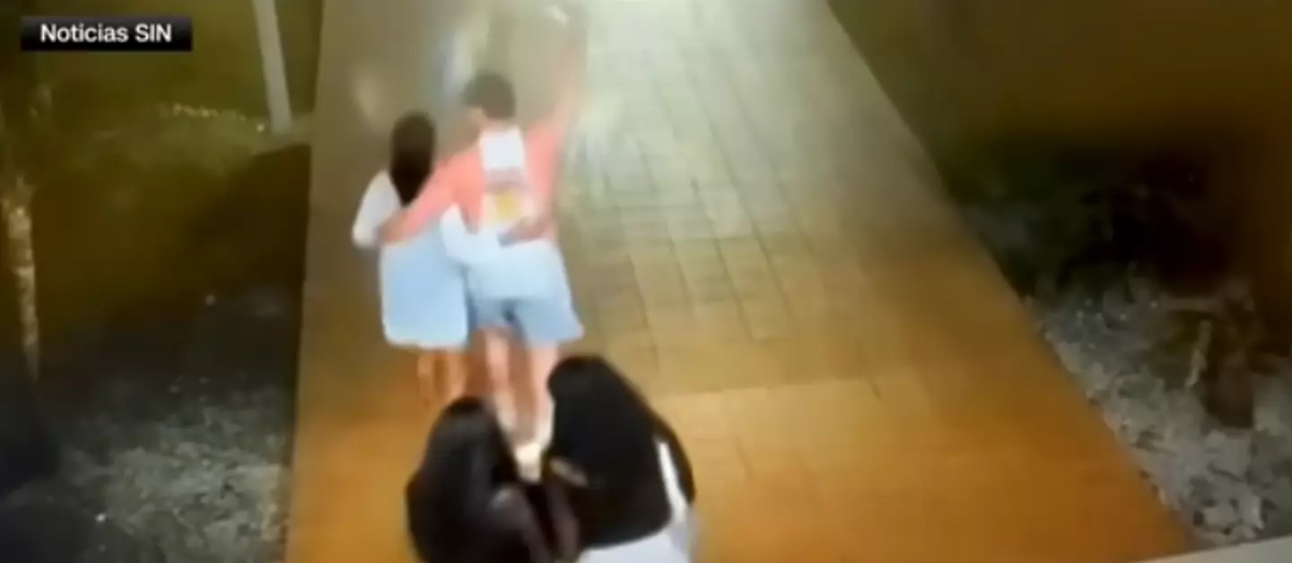 Footage shows her walking arm-in-arm with a 'person of interest' (WTVR CBS 6)