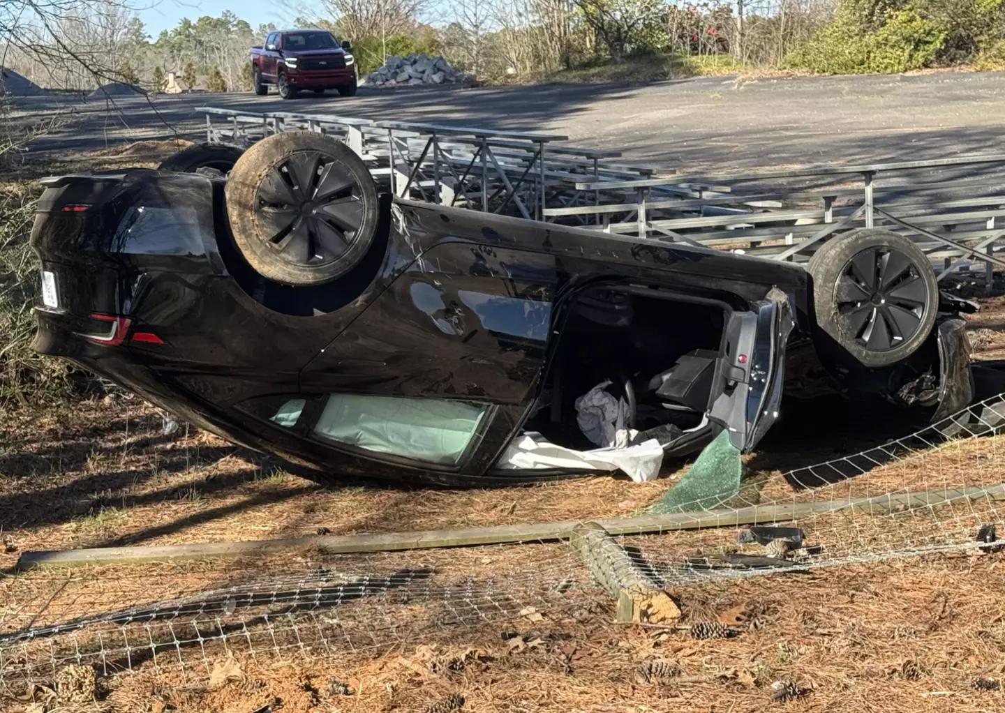The Tesla flips after hitting the tree (Reddit/SynNightmare)
