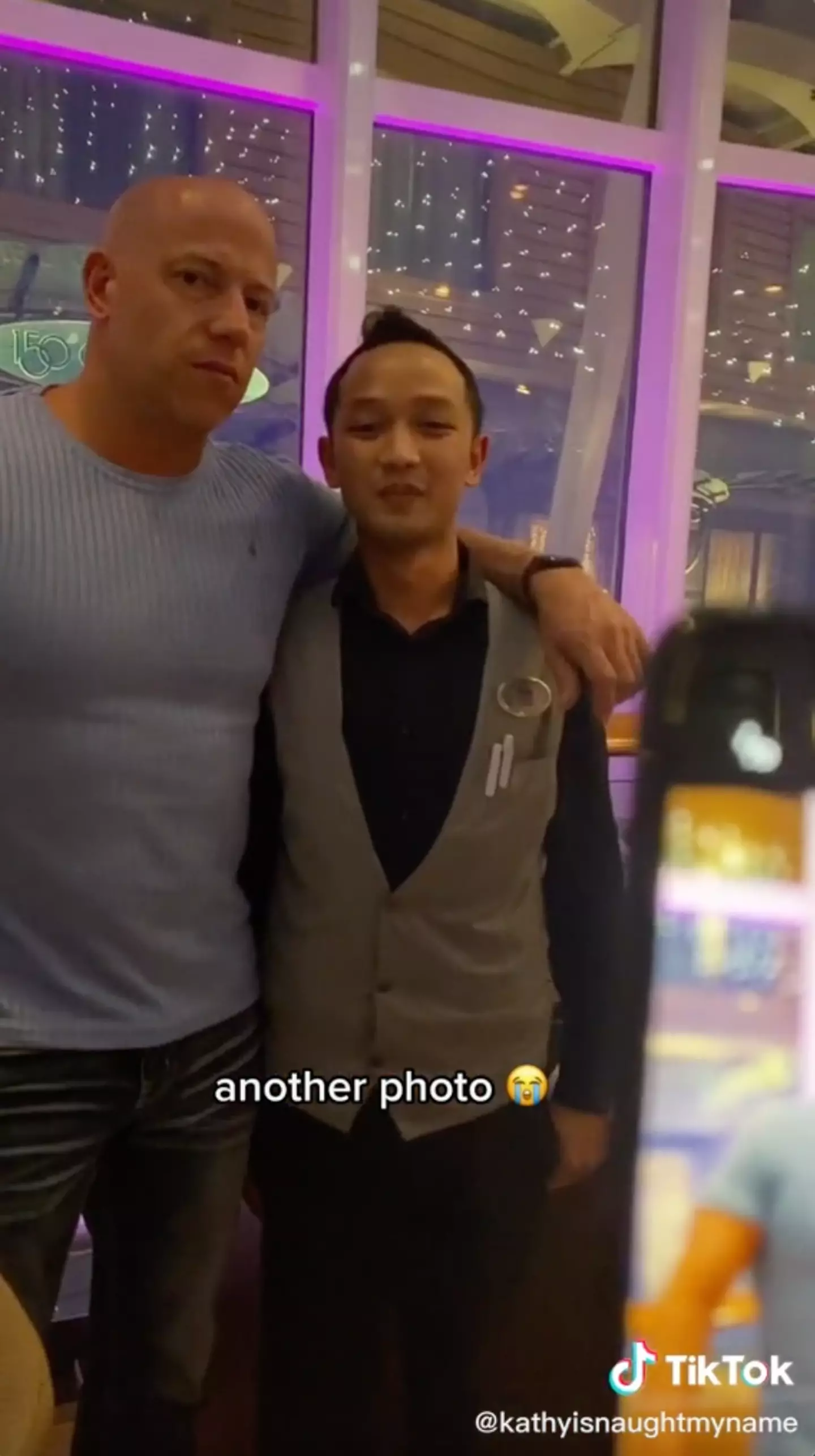 Her boyfriend always takes the time for a photo.