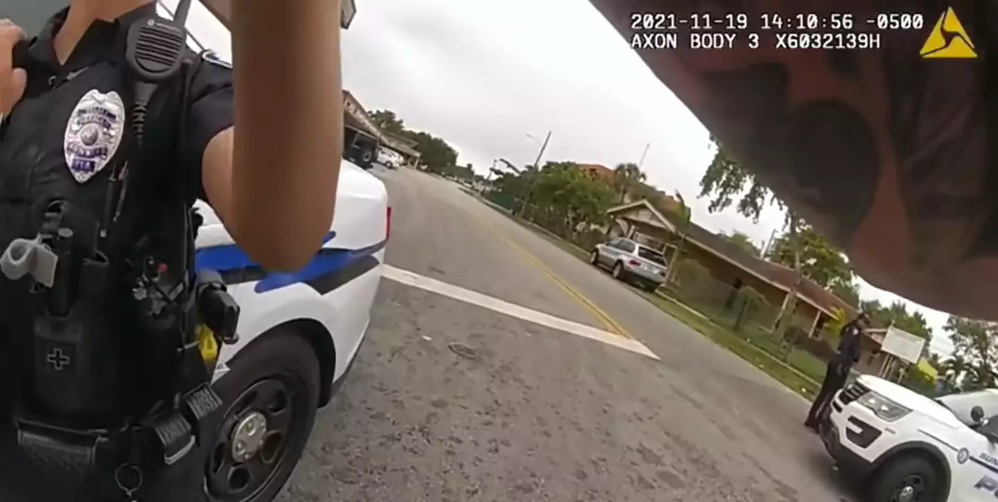Bodycam footage shows a female police officer being grabbed.