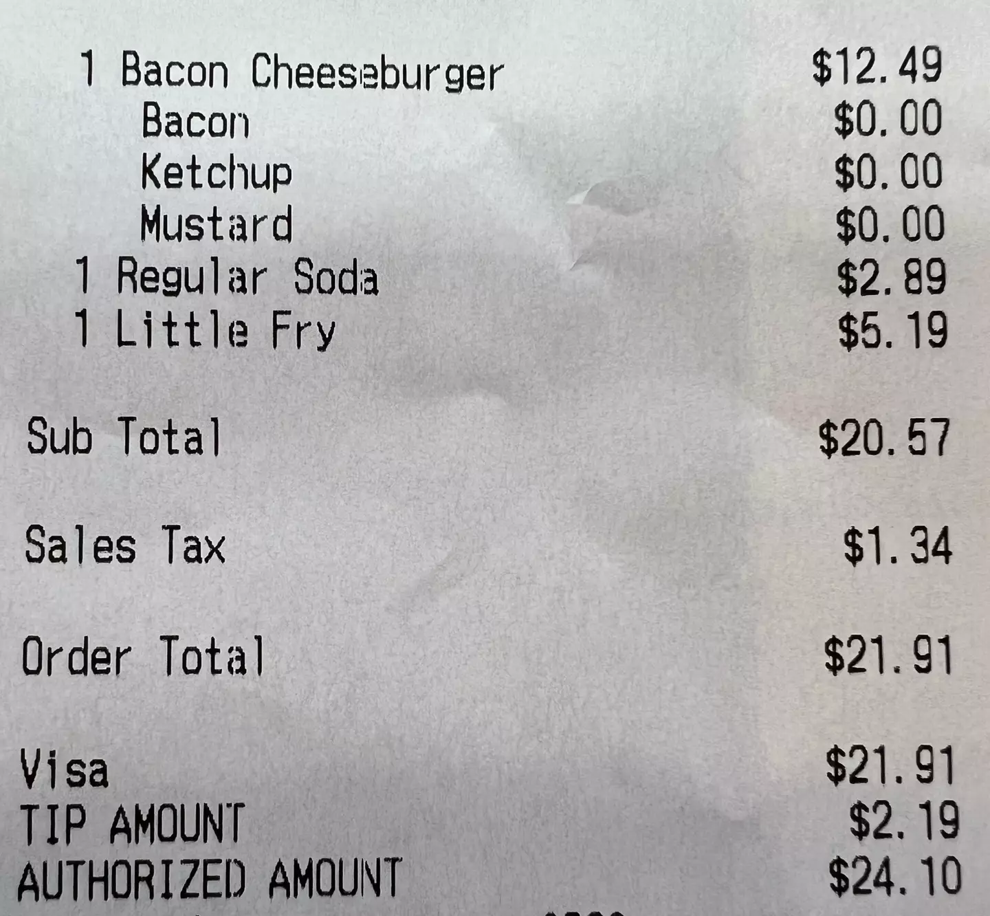 The receipt showed just how much the burger, fries, and soda cost.