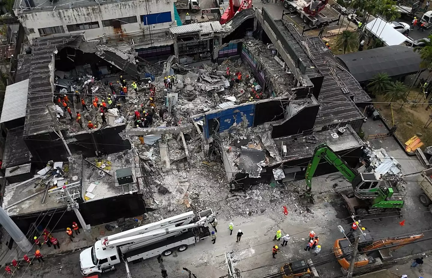 Aerial view shows rescue teams working at the Jet Set nightclub a day after the collapse of its roof in Santo Domingo (ALFRED DAVIES/AFP via Getty Images)