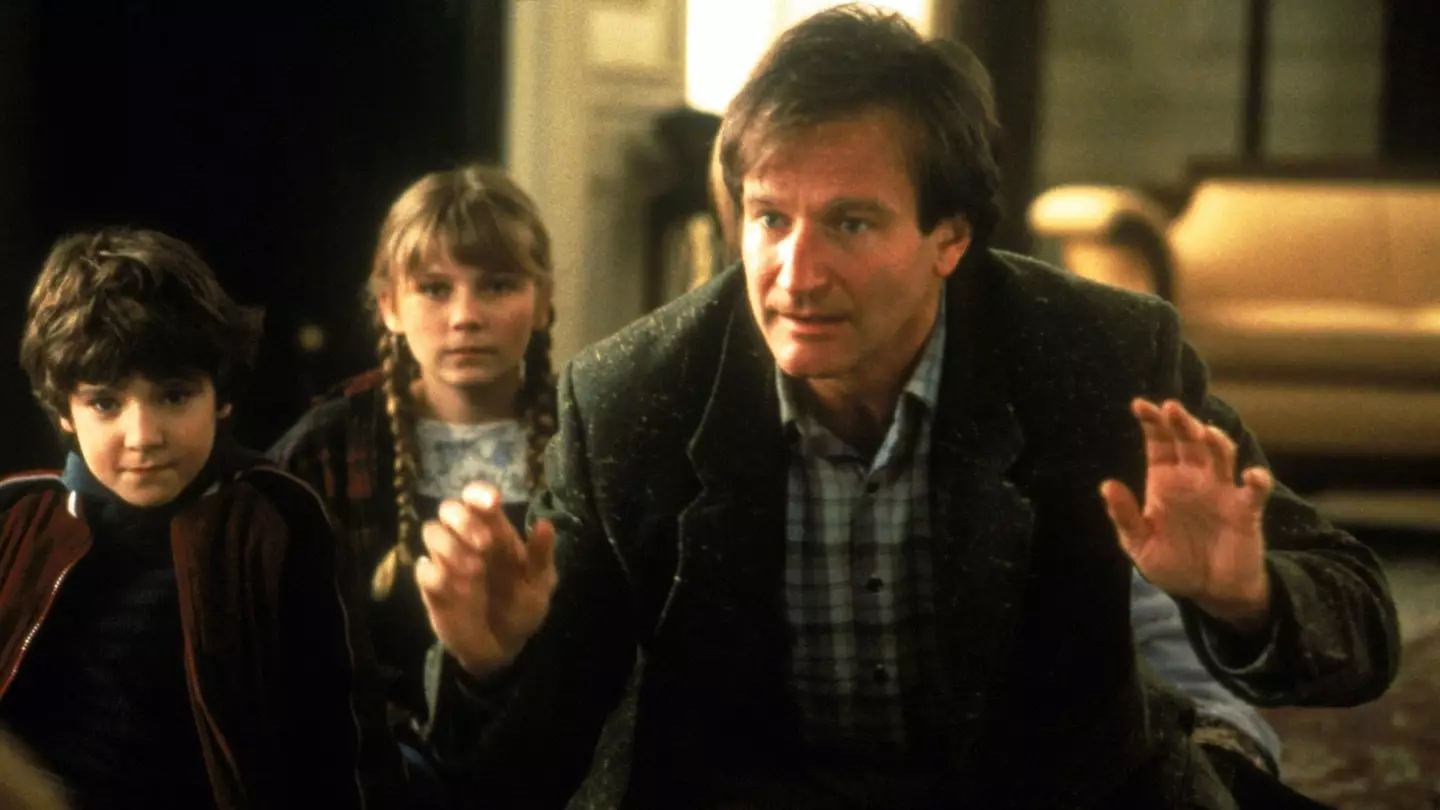 Bradley Pierce, Kirsten Dunst and Robin Williams in Jumanji.