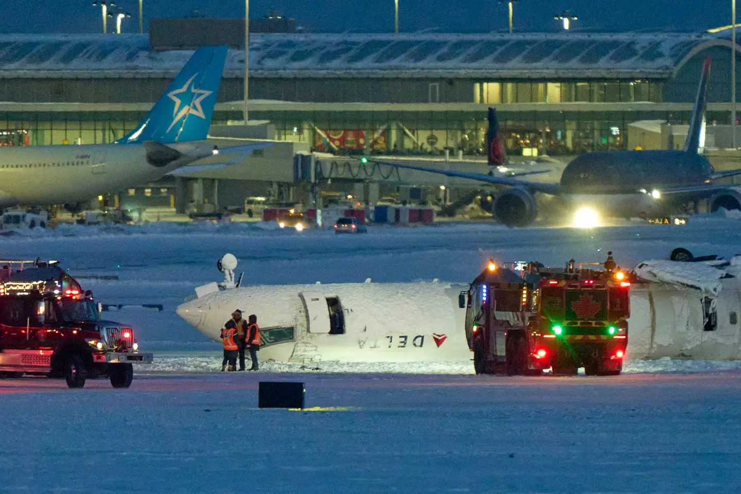 The Delta Airlines plane crashed in Toronto on Monday (GEOFF ROBINS/AFP via Getty Images)