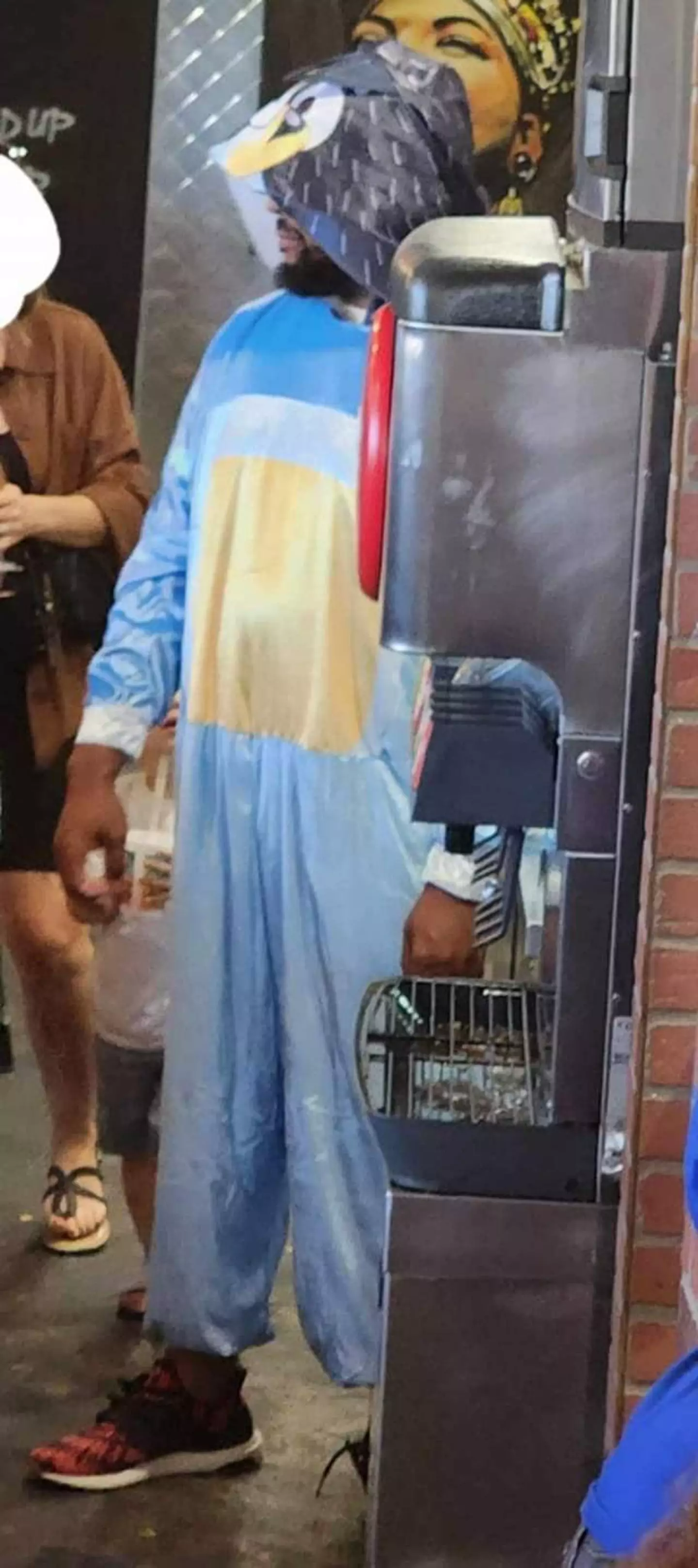 Bluey was portrayed by a man wearing a onesie, much to parents' disappointment. (X/@LasVegasLocally)