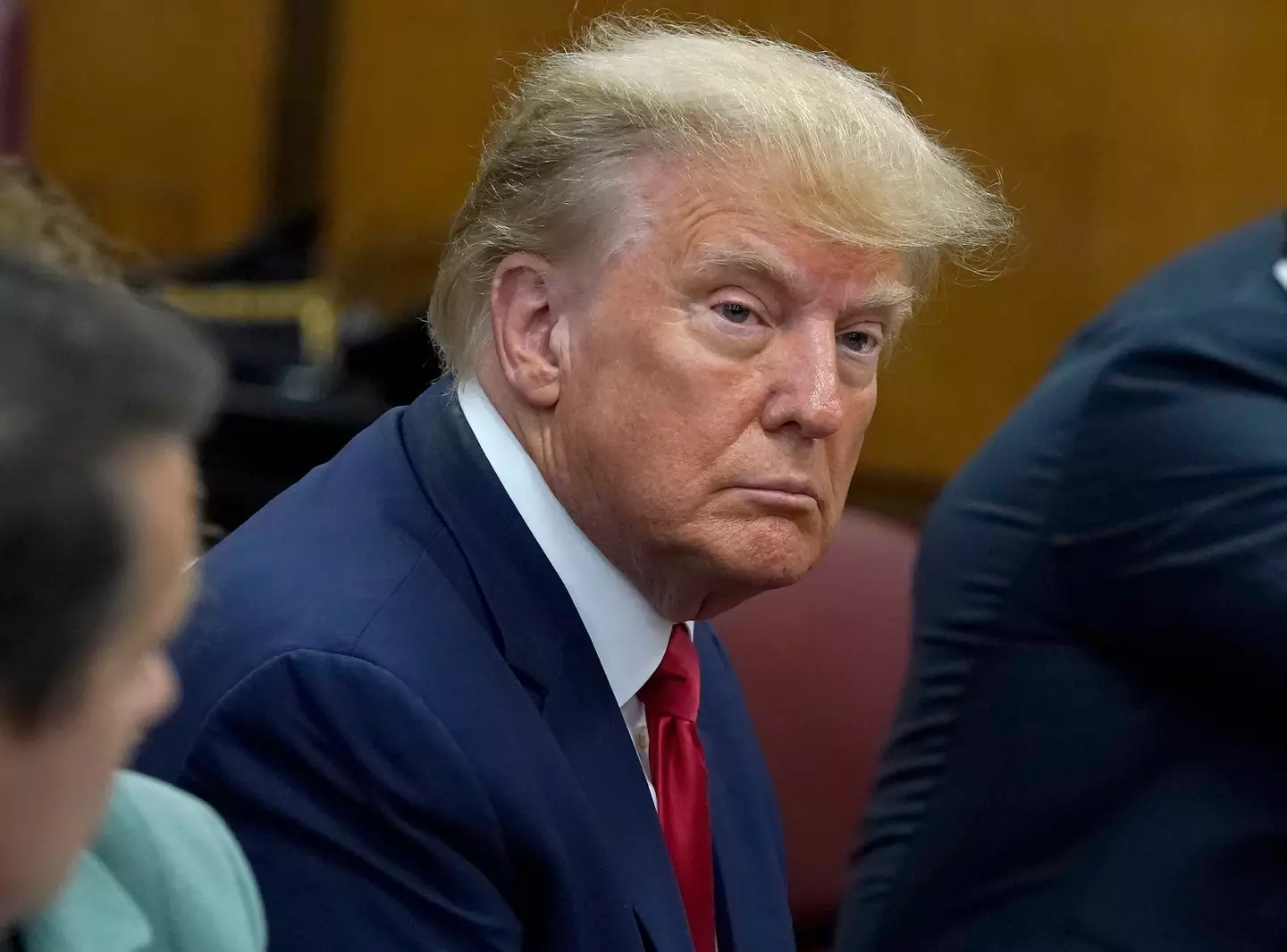 former U.S. President Donald Trump attends a pre-trial hearing at Manhattan Criminal Court on February 15.