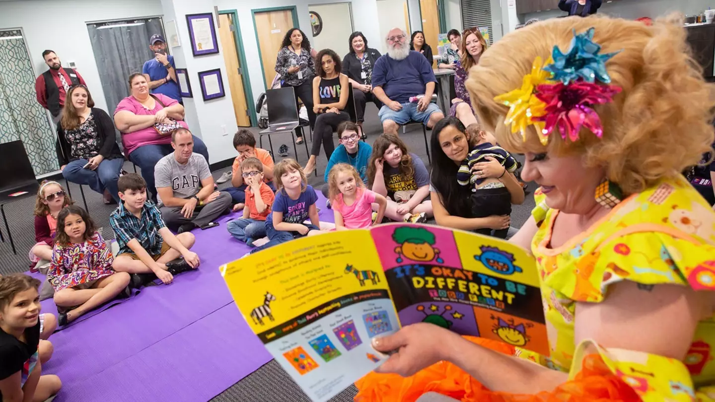 Rich Kuntz, also known as Gidget, reads to children during Drag Queen Story Hour.