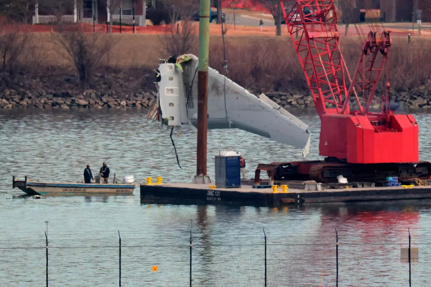 The wreckage being pulled from the Potomac River (Chip Somodevilla/Getty Images)