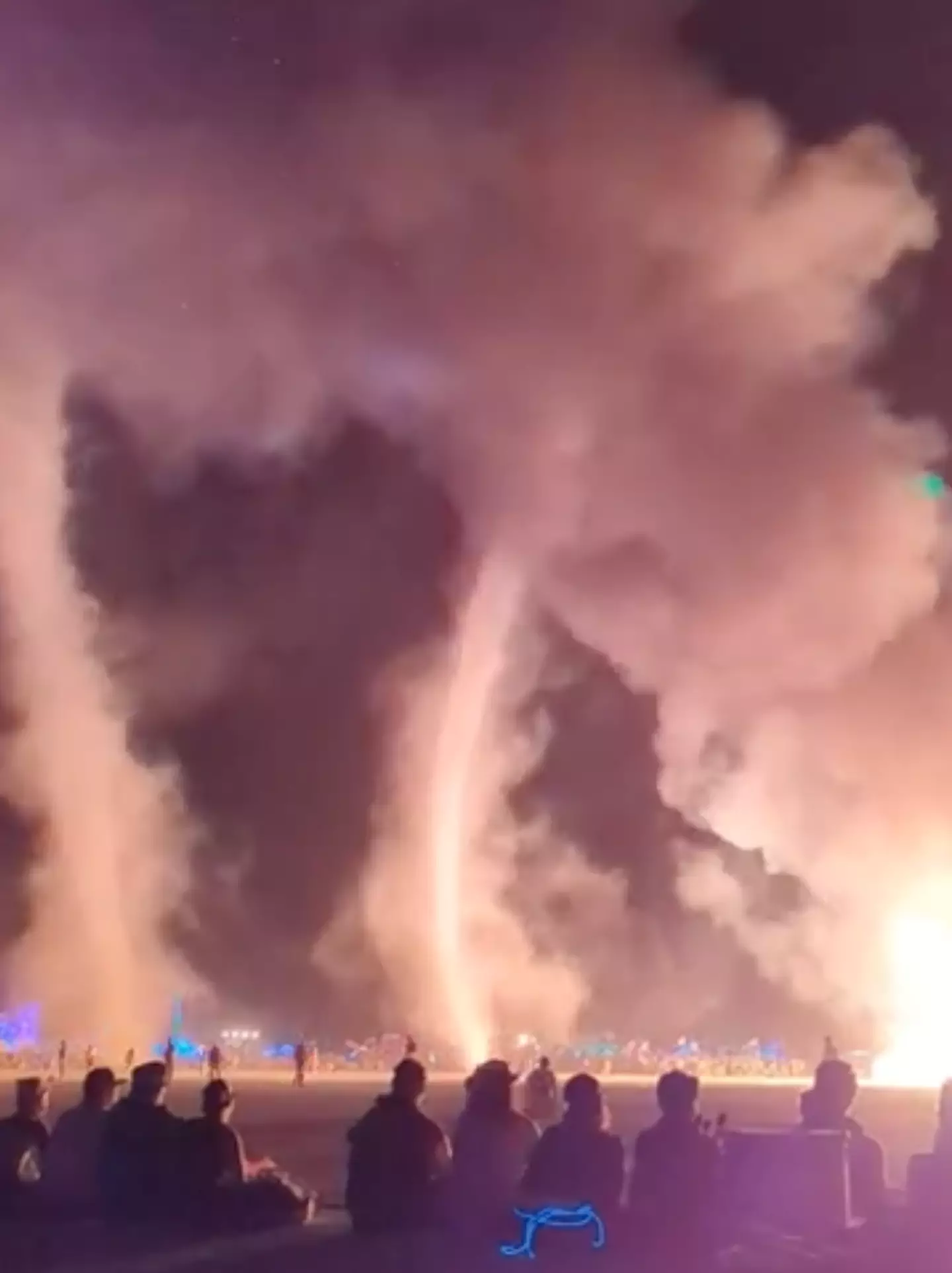 Fire tornadoes swirled around the burning man.