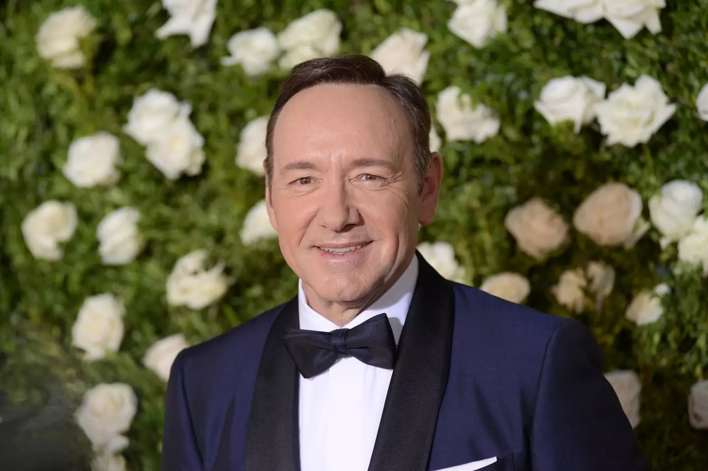 Kevin Spacey has said he will voluntarily appear in British court.