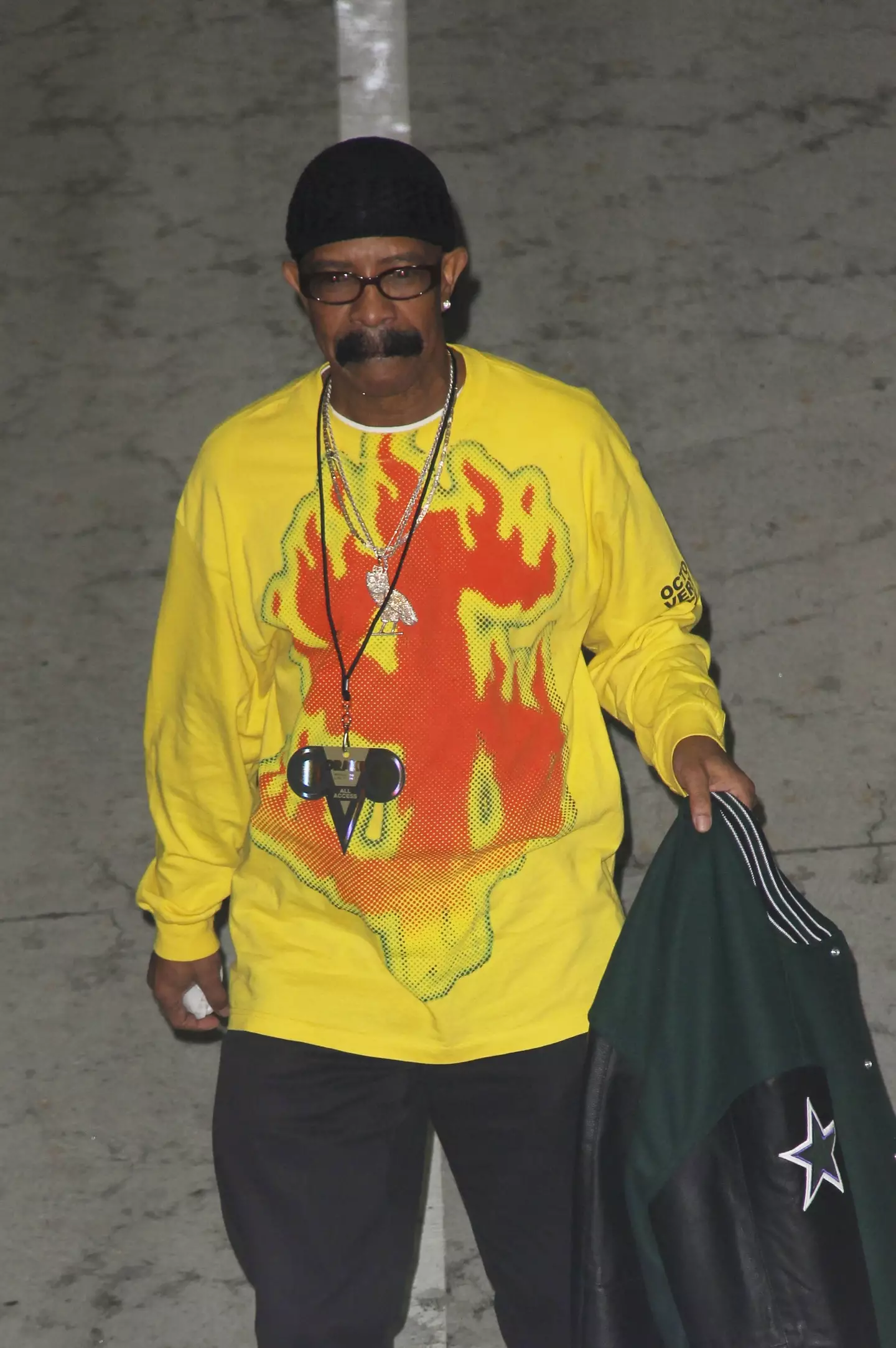Drake's dad Dennis Graham arriving at one of his son's concerts.