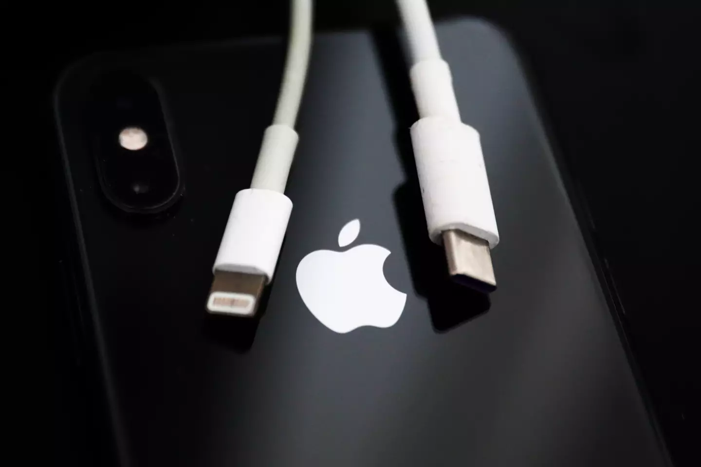 "Sleeping or sitting on the charging cable or connector should be avoided," Apple has said.