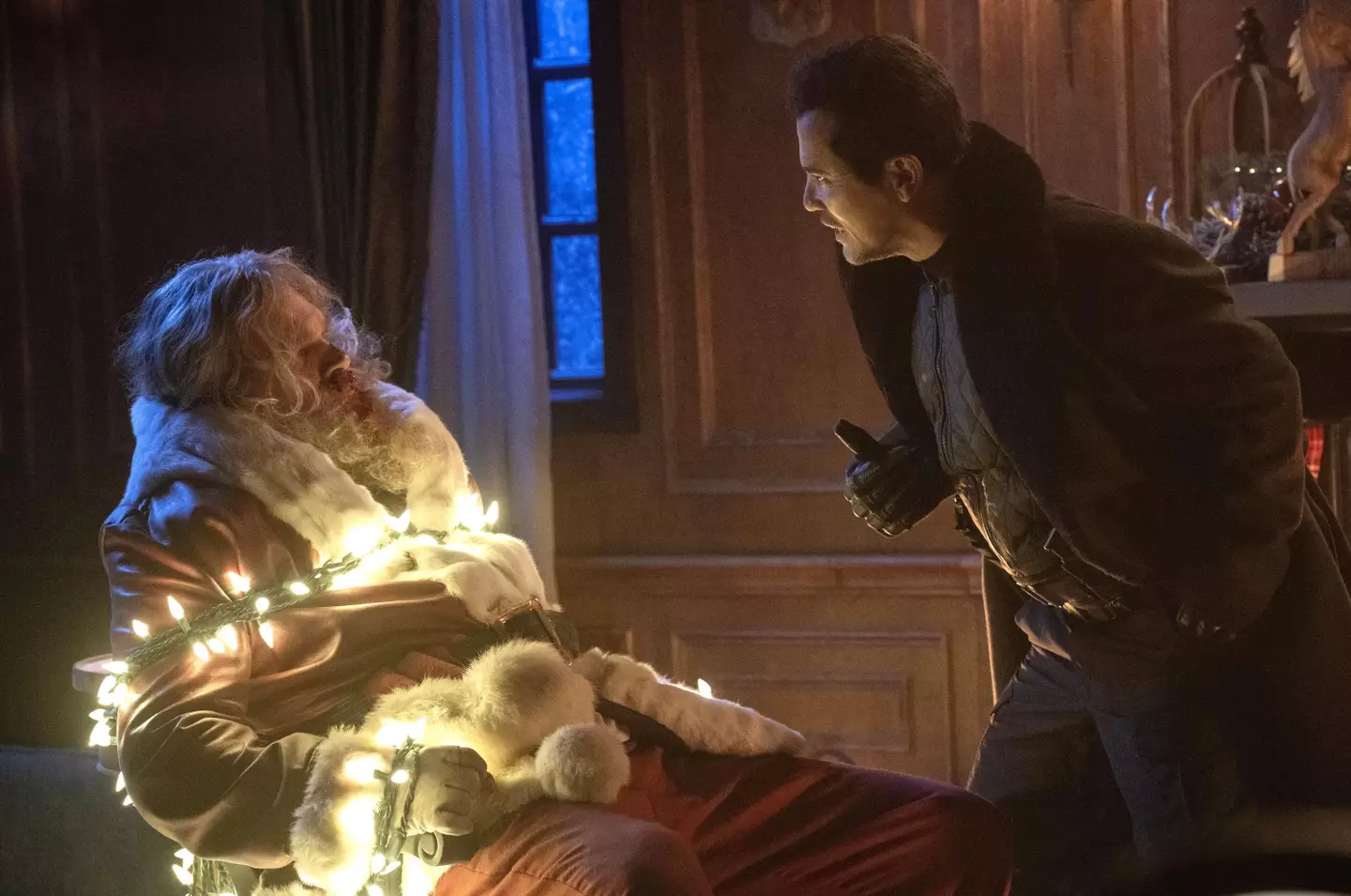 David Harbour's Santa Claus does battle with John Leguizamo's hostage taker in Violent Night.