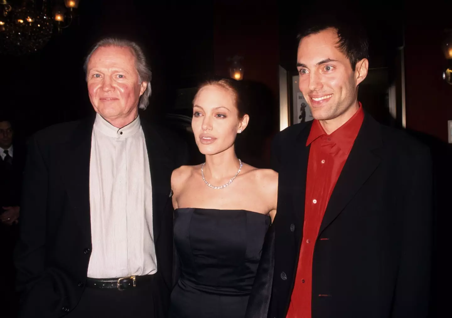 Angelina Jolie and James Haven with their dad.