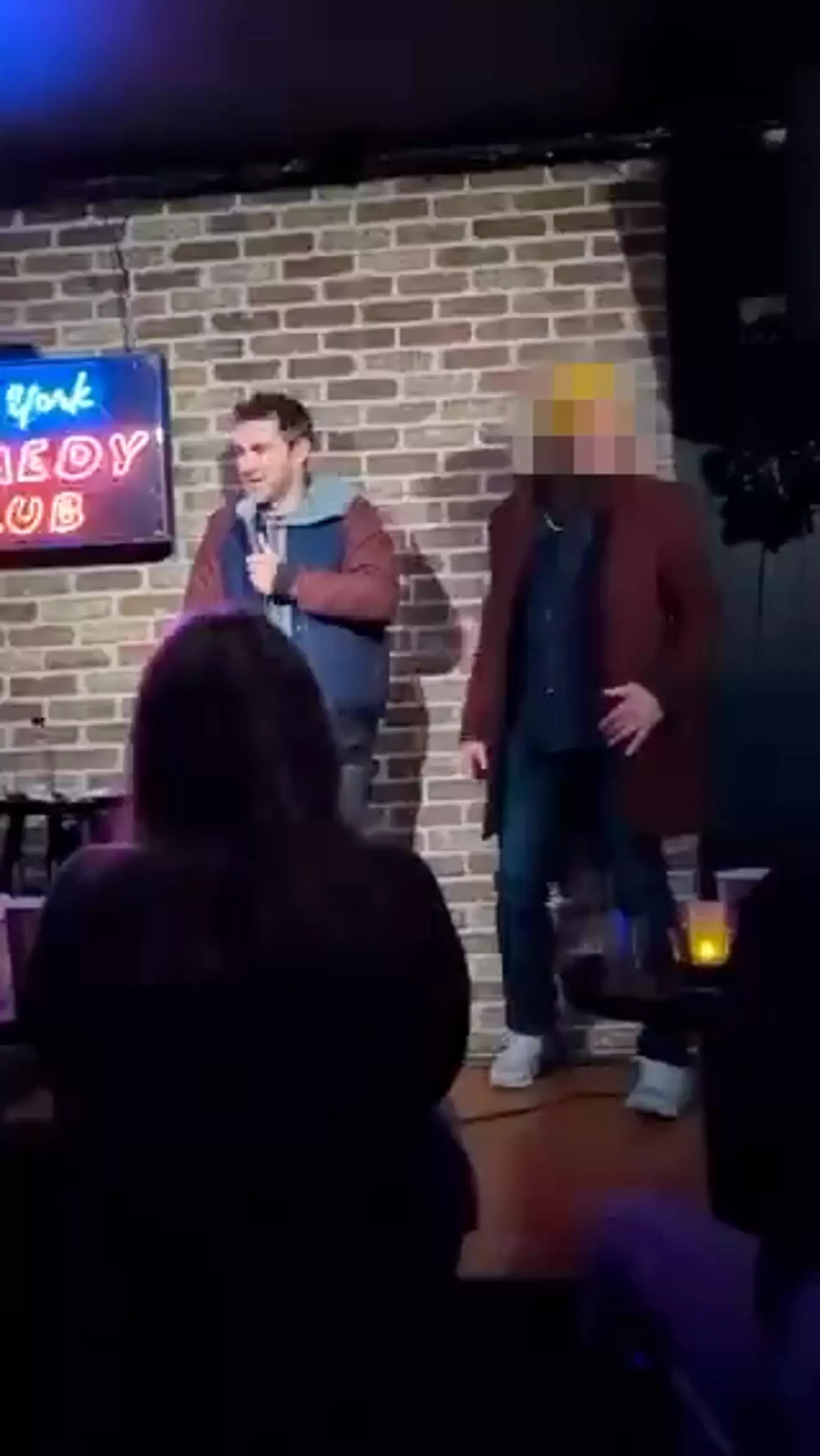 Mark Normand was joined on stage by a random man.