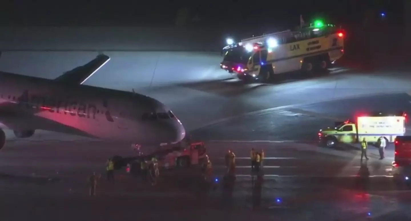 The bus windshield has severely damaged by the plane collision.