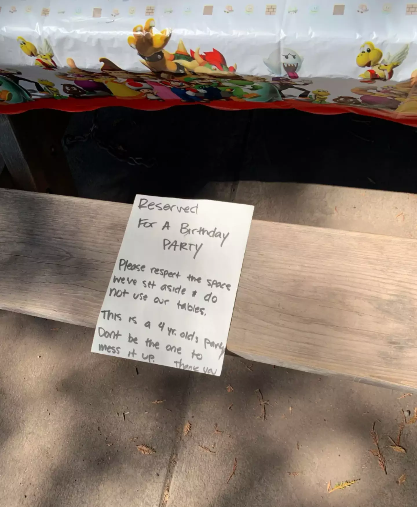 The note from parents 'reserving' park benches has been slammed as 'entitled'.