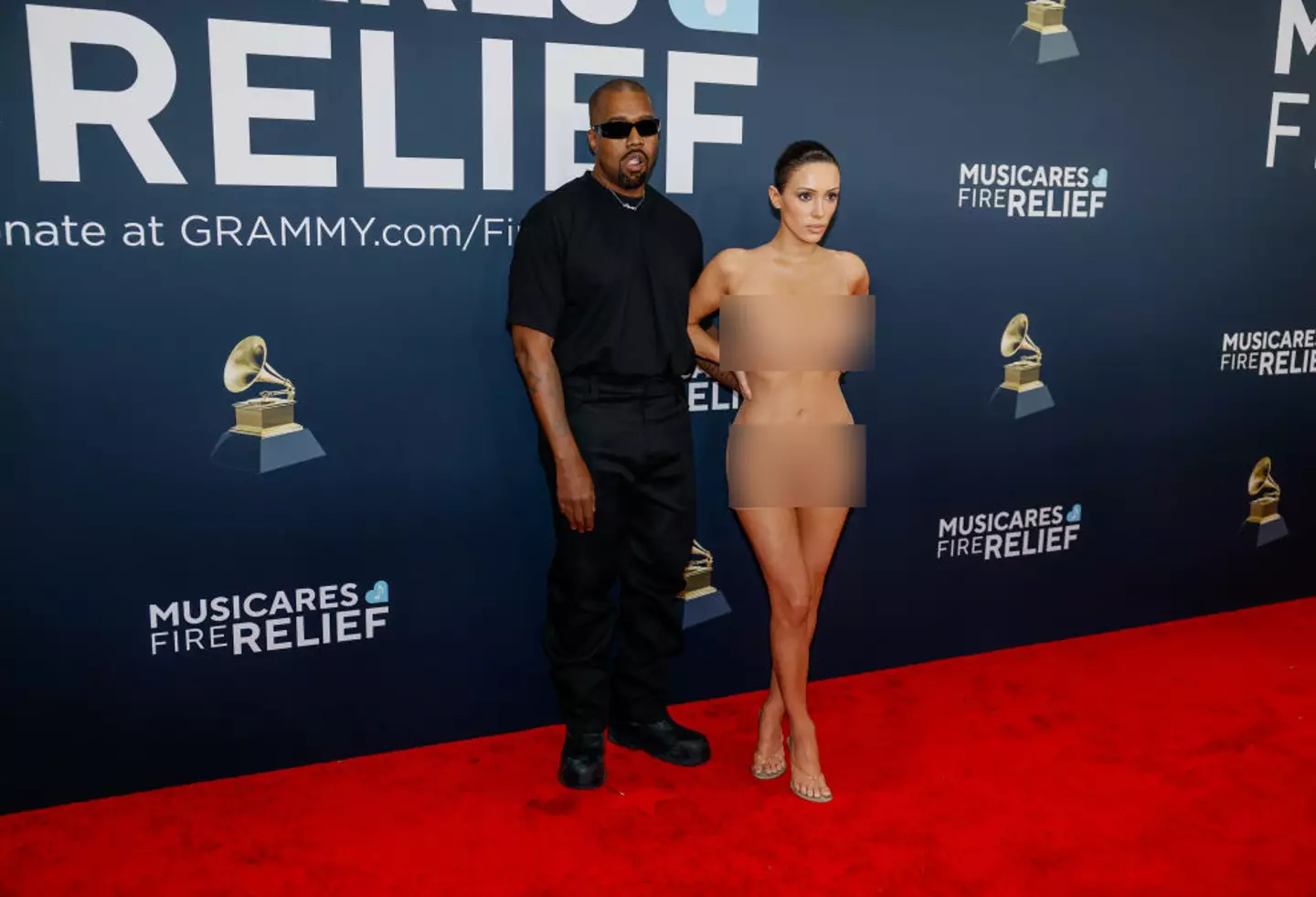 The model posed in mesh skin tight outfit for the Grammys (Allen J. Schaben / Los Angeles Times via Getty Images)