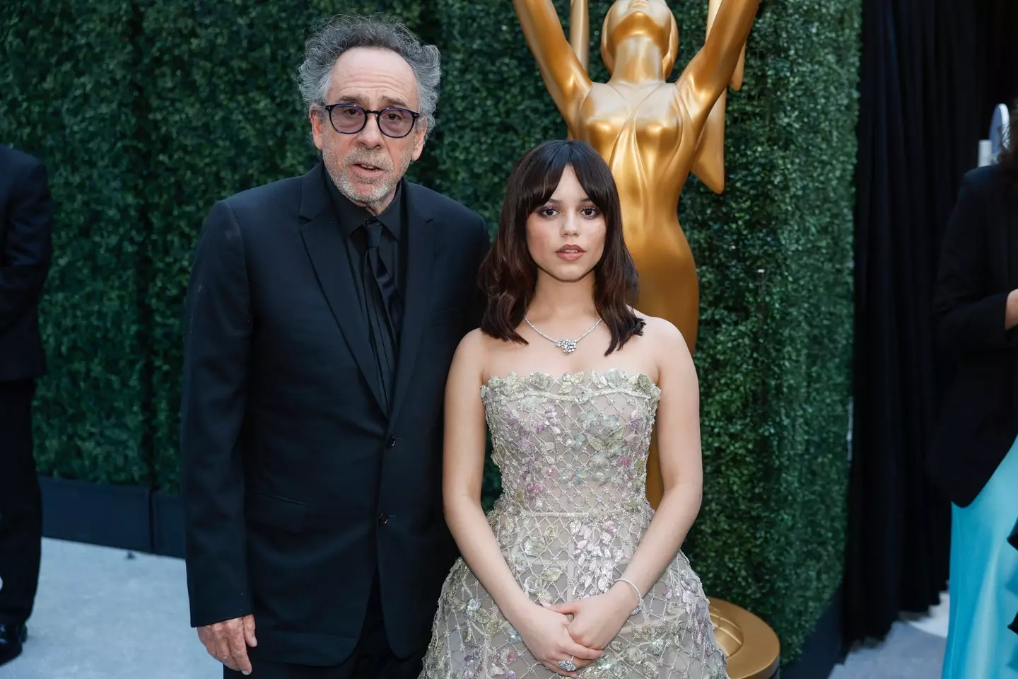 Tim Burton and Jenna Ortega (Allen J Schaben via Getty Images)