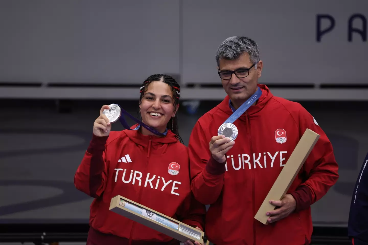Shooters Şevval İlayda Tarhan and Yusuf Dikeç. (Turkish Youth&Sports Ministry / HANDOUT/Anadolu via Getty Images)