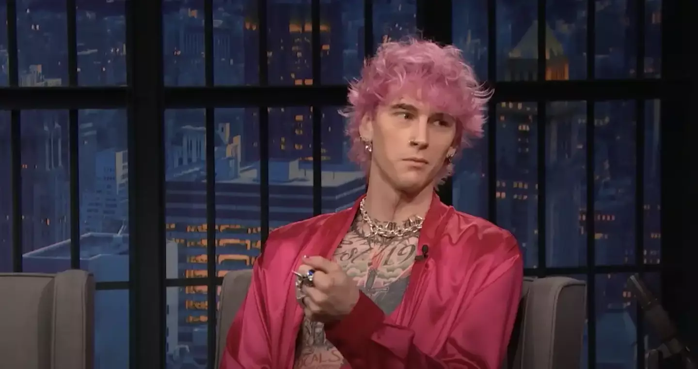 MGK explained why he smashed a glass in his face on Late Night with Seth Meyers.