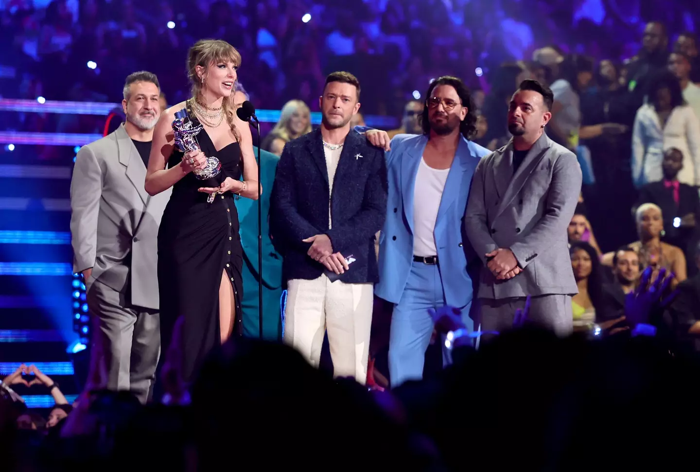 The band presented Taylor Swift with an award and announced a new single.