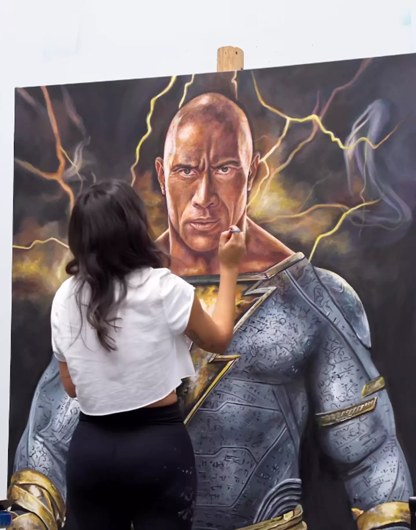Weber presented the painting at the World Premiere for Black Adam.